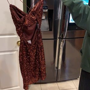 Selling a dress (size small) that is a copper color! Brand new and never worn!